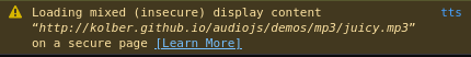 A console log line that says: "Loading mixed (insecure) display content “http://kolber.github.io/audiojs/demos/mp3/juicy.mp3” on a secure page"